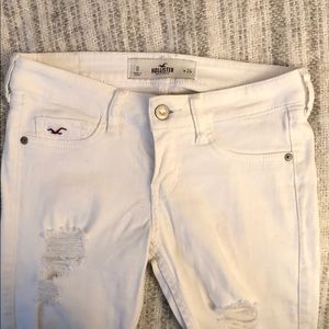 White pants with trendy holes
